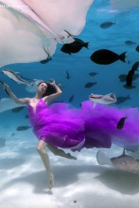 Underwater Model Katrin Gray dances with Sting Rays for Fashion shoot