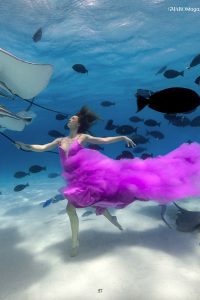 Underwater Model Katrin Gray dances with Sting Rays for Fashion shoot